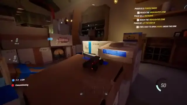 Two WheelMates RC cars solving an early Kitchen-area co-op puzzle